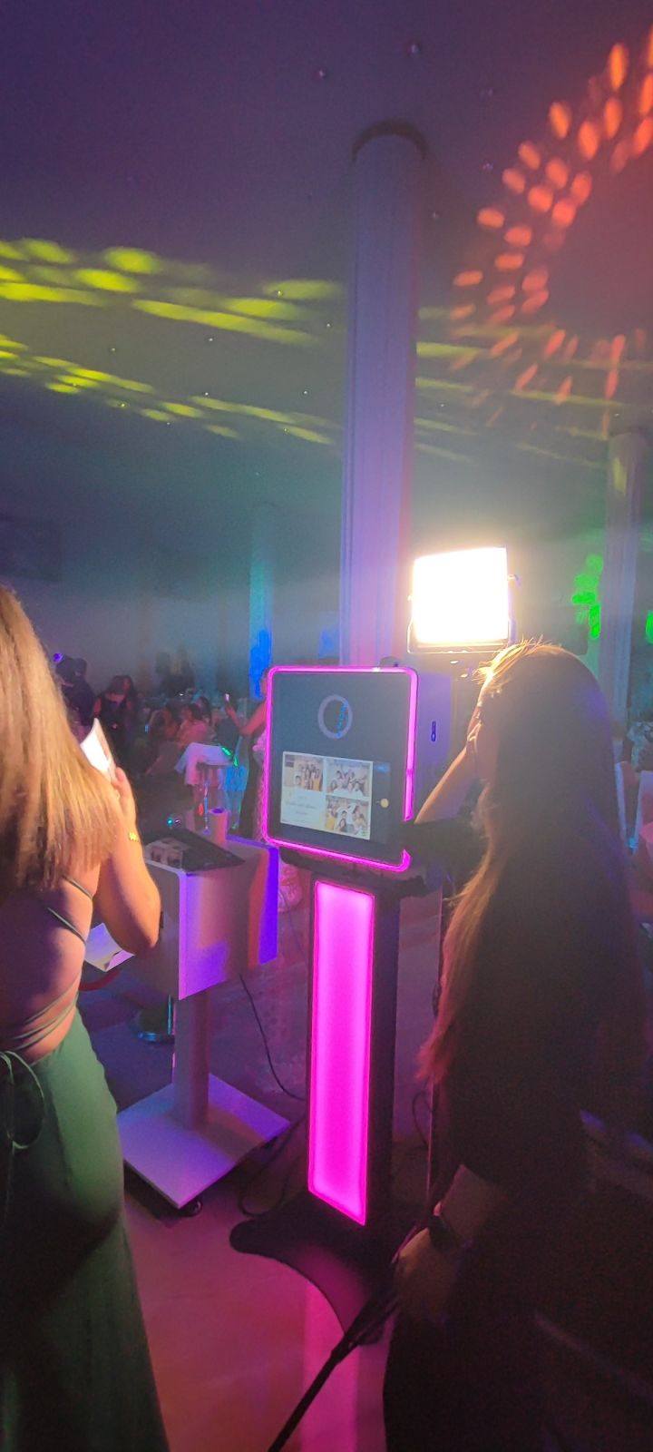 The booth lit up on an evening dance floor — Fotobooth.mu, Mauritius